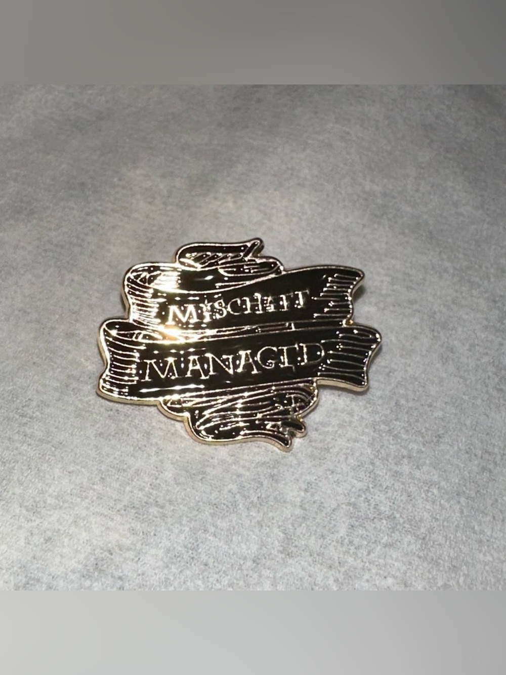 Harry Potter mischief managed brooch pin.